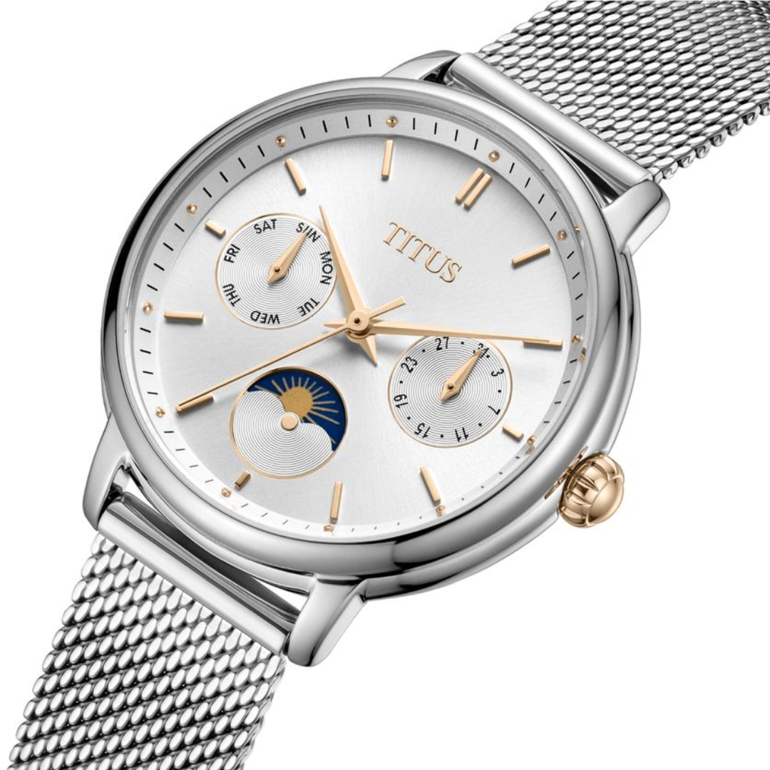 Fashionista watch close-up showing silver-white dial and day/night indicator