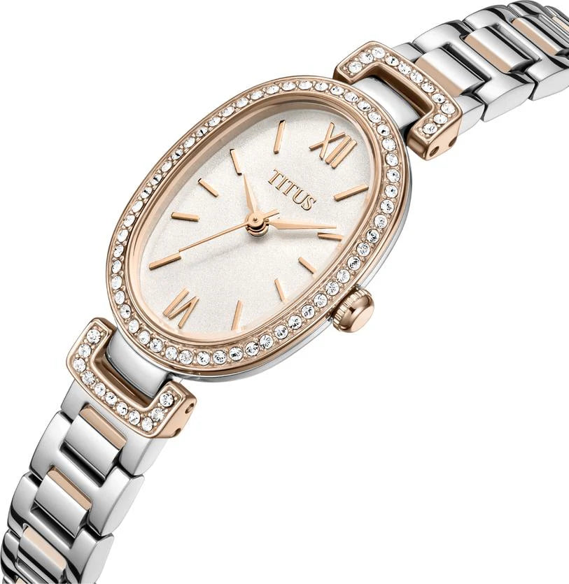 Fair Lady watch crown detail showing polished stainless steel oval case
