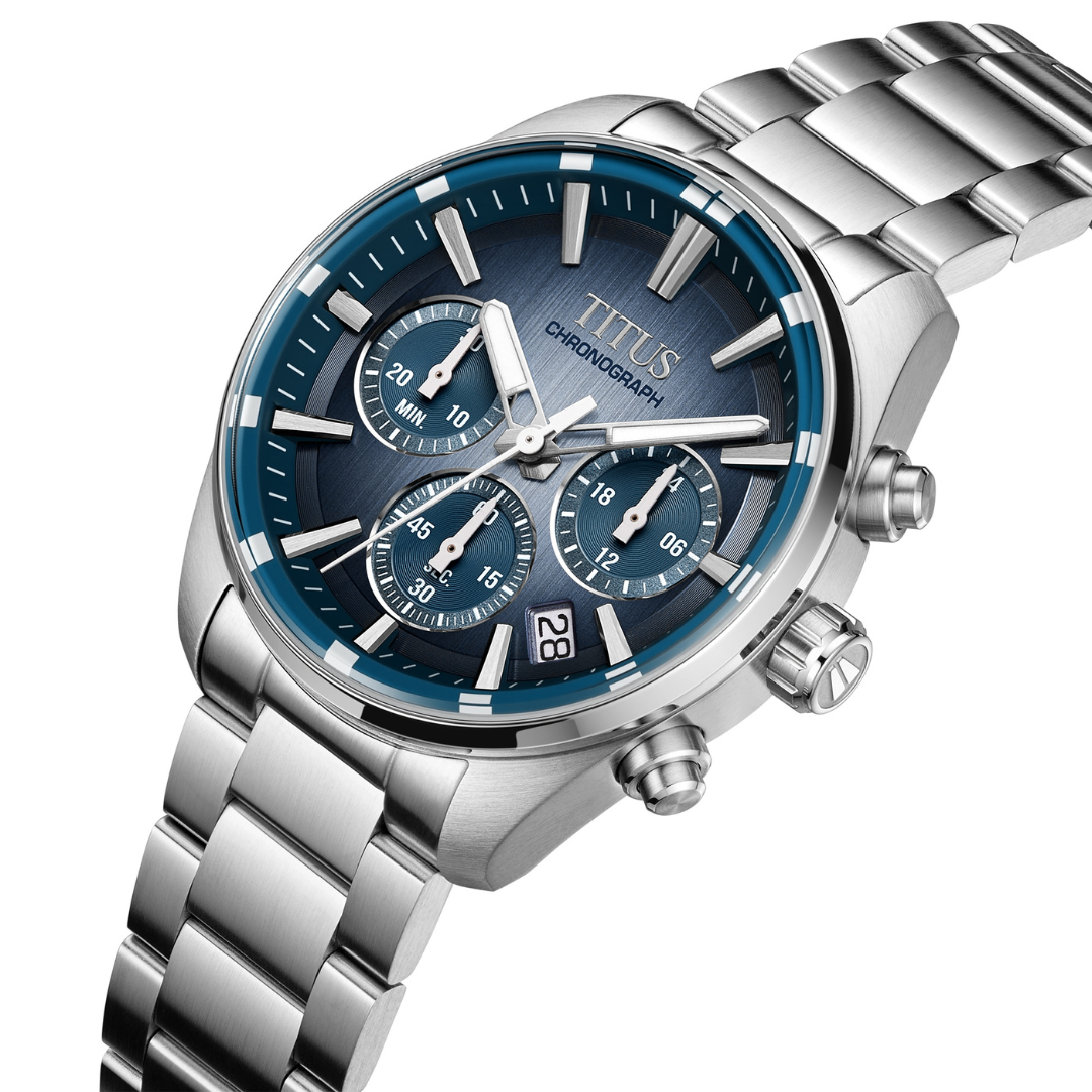 Solvil et Titus Saber Chronograph W06-03414-004 — angled view showing deep blue dial, blue chronograph subdials, crown engraved with the saber-toothed tiger's tooth symbol, date display at 4 o'clock