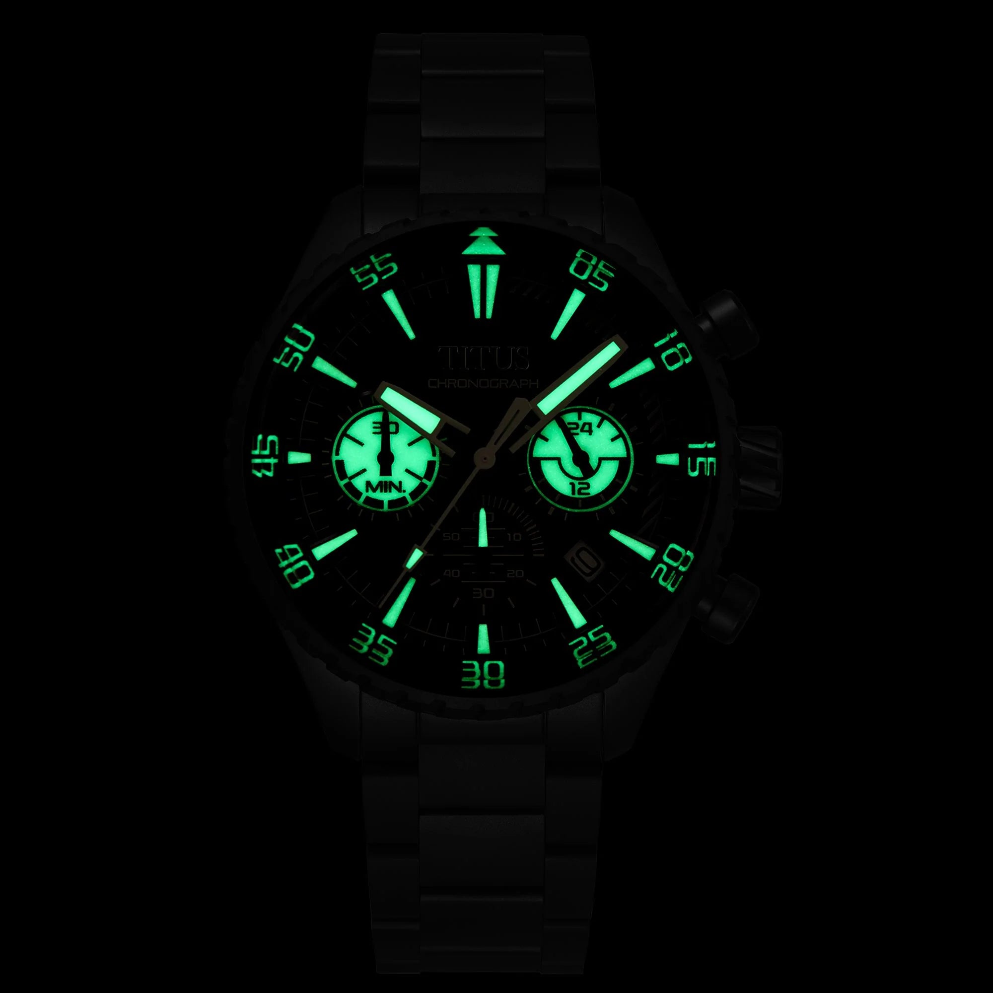 Saber Chronograph watch showing luminous dark grey dial in low light