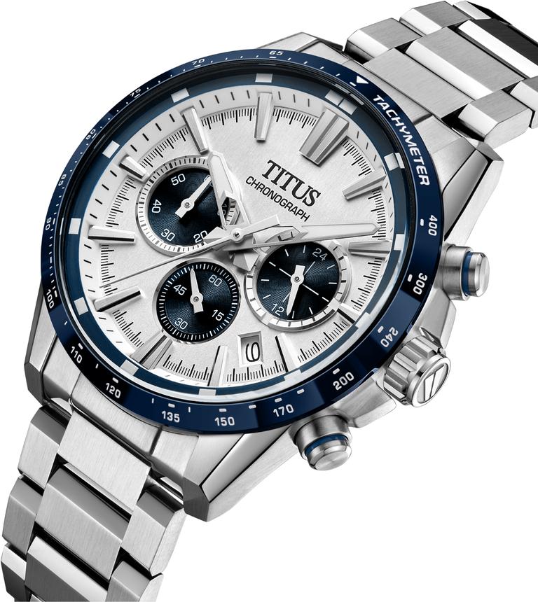 Solvil et Titus Saber Chronograph W06-03401-002 — angled view showing blue tachymeter bezel, crown engraved with the saber-toothed tiger's tooth symbol and blue accent, and 24-hour subdial