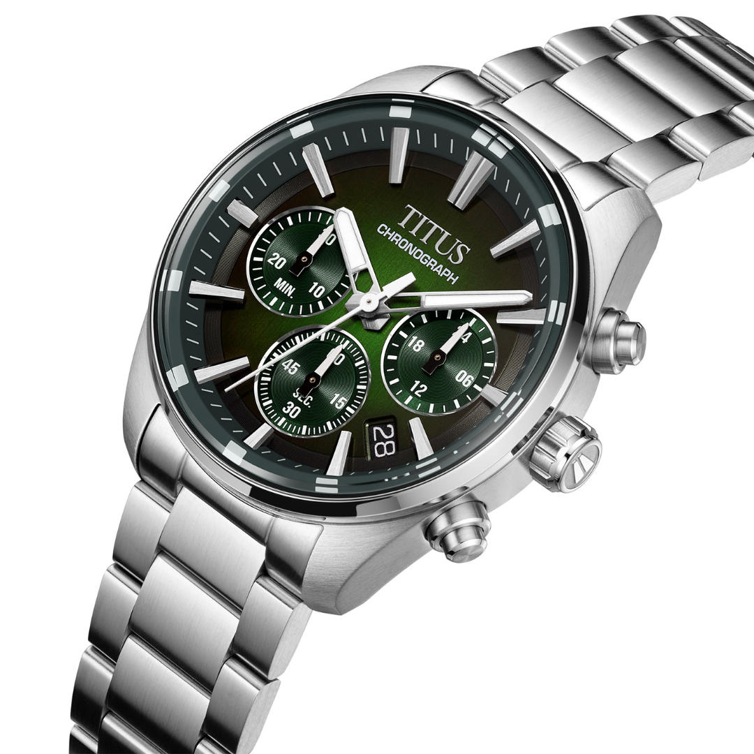 Solvil et Titus Saber Chronograph W06-03414-002 — angled view showing deep green sunburst dial, three green chronograph subdials with concentric texture, crown engraved with the saber-toothed tiger's tooth symbol, and date display at 4 o'clock
